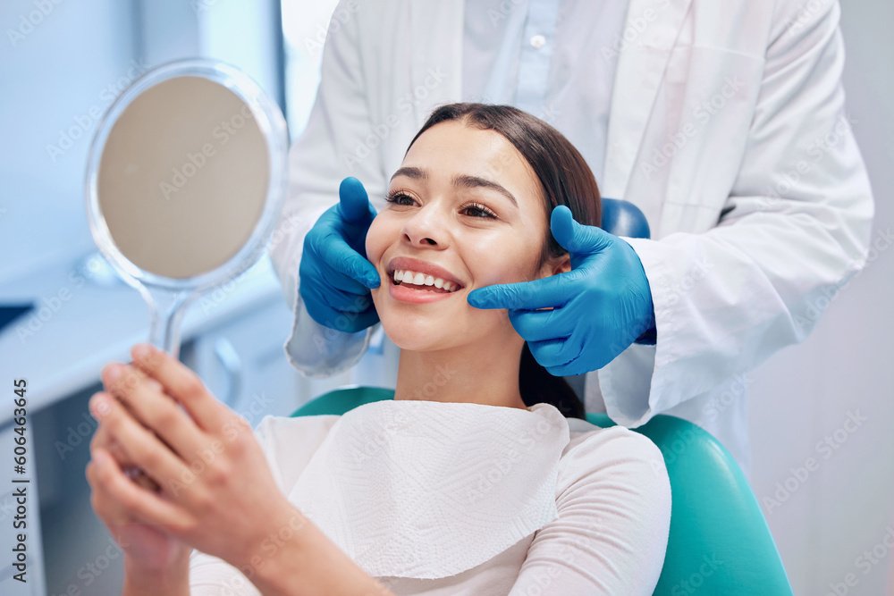 Dentist, mirror and woman check smile after teeth cleaning, braces and dental consultation. Healthcare, dentistry and happy female patient with orthodontist for oral hygiene, wellness and cleaning